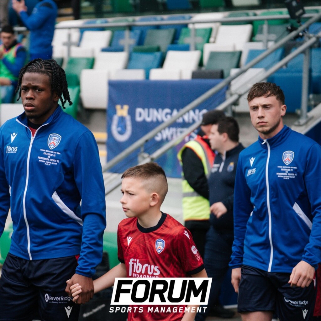 Irish Cup Champions: Shevlin and Okoro Lift the Trophy with Coleraine